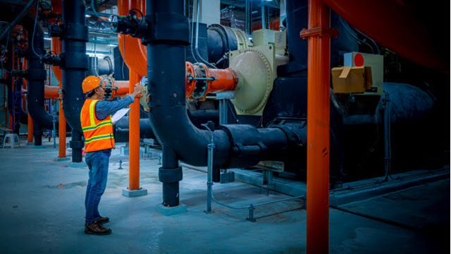 Person working with energy efficient commercial chillers
