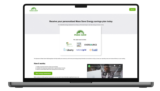 A laptop open to an mass save online commercial assessment