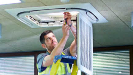 man changing lightbulb