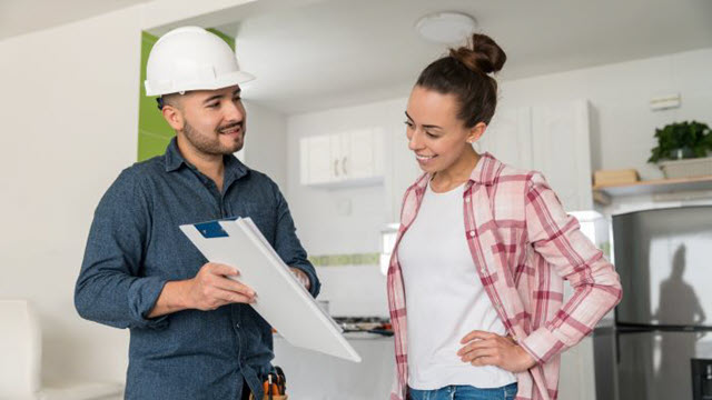 Contractor helping customer