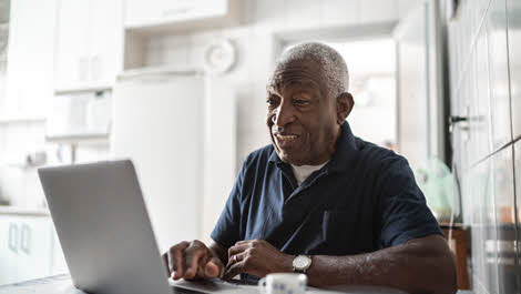 A person looking at a laptop