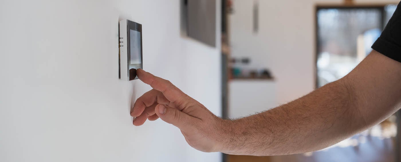A Massachusetts resident configuring their smart thermostat system