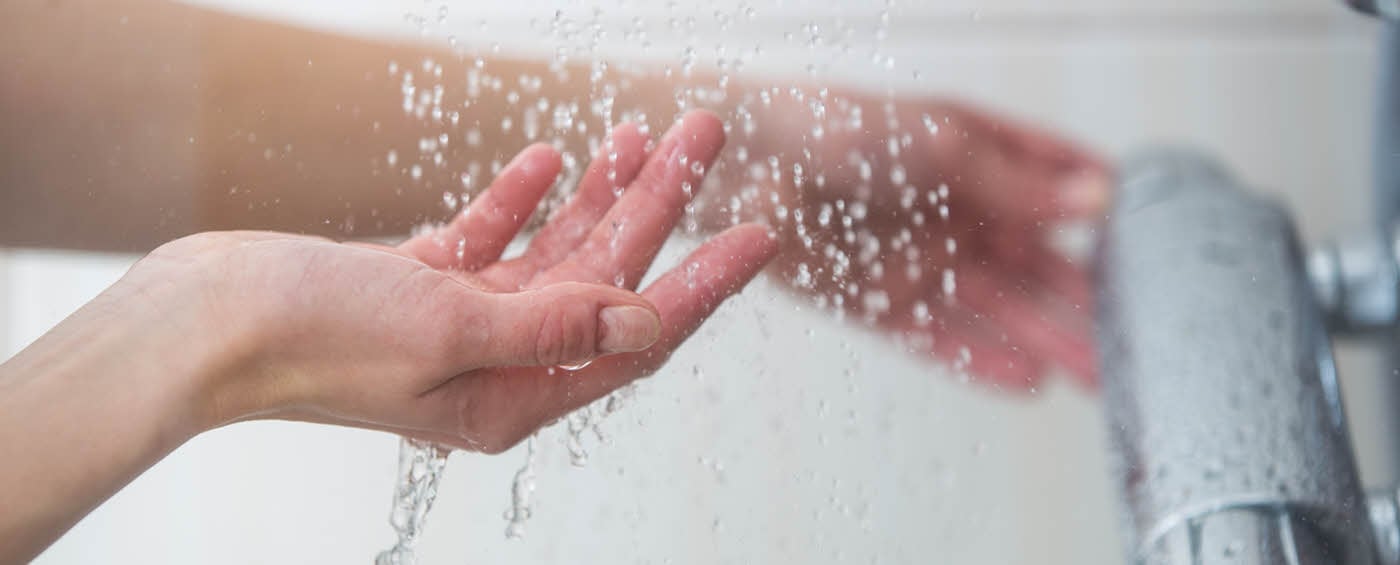 Hands in a shower
