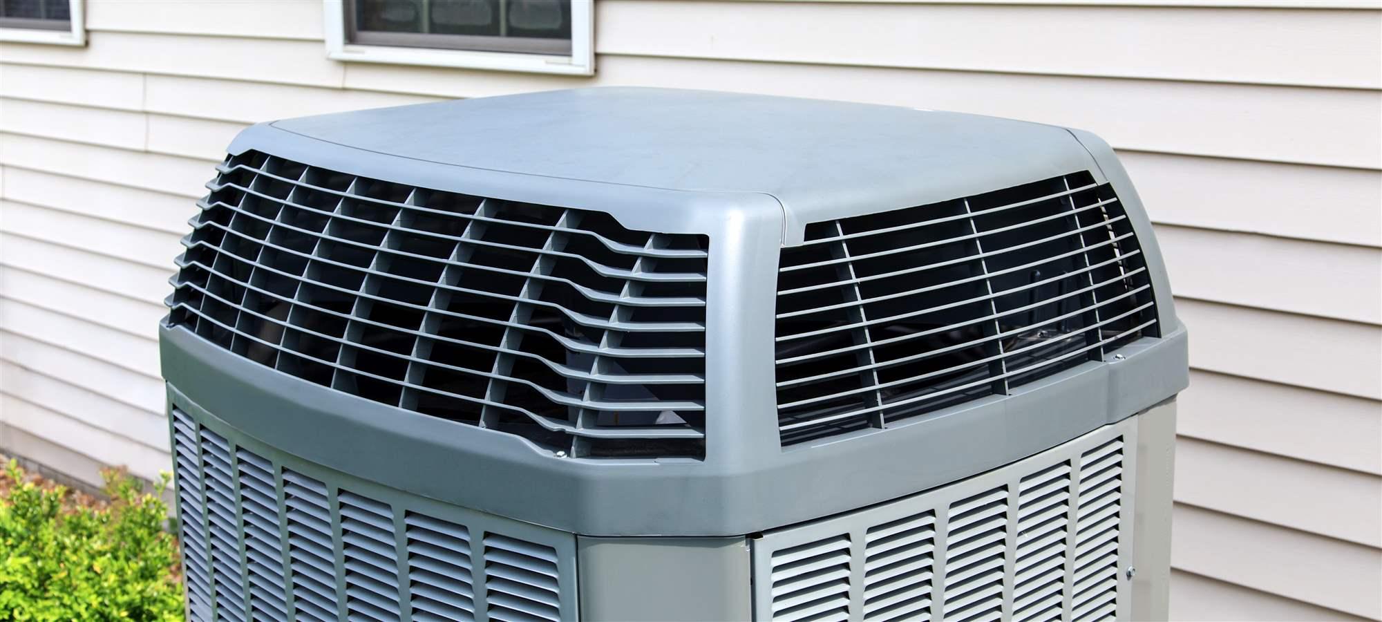 A heat pump outside a residential home